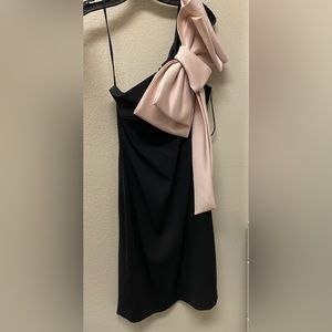 Black dress with pink bow